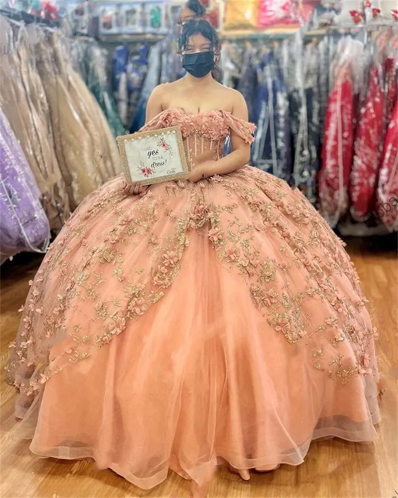 Peach and shop gold quinceanera dresses
