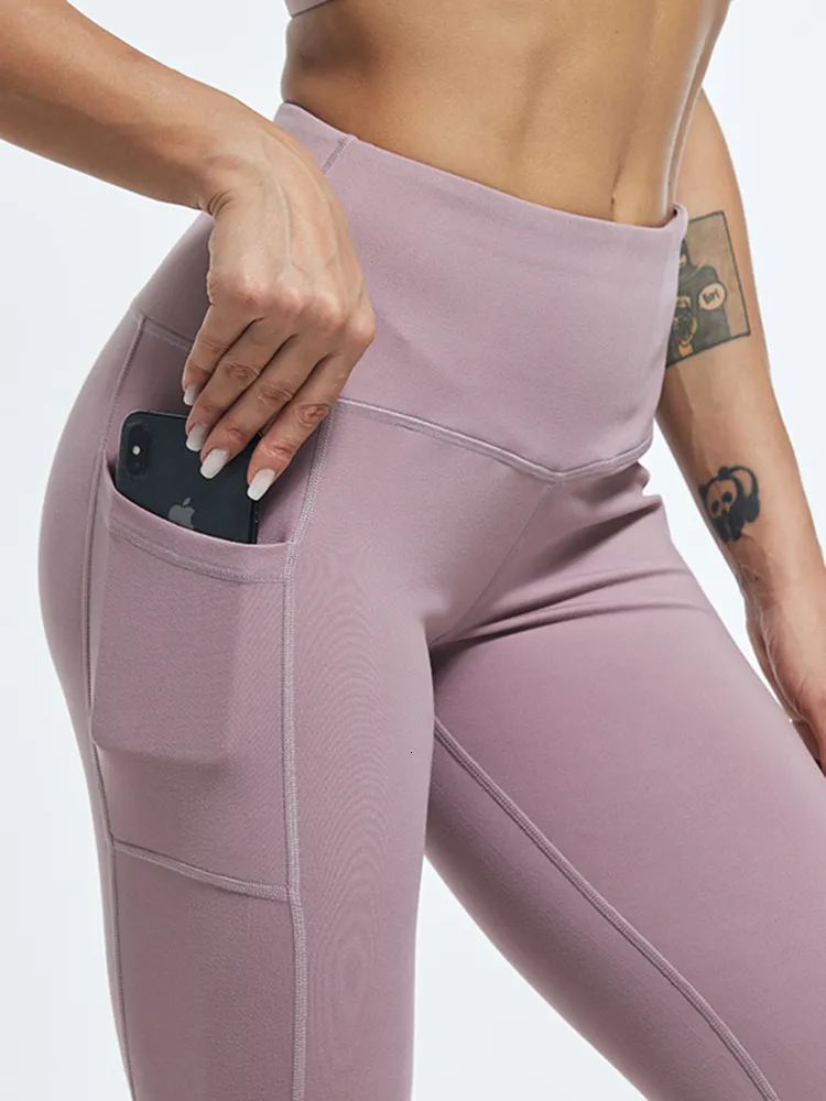 Legginsy dla kobiet Athvotar Middle talia Legginsy z kieszenią elastyczne kobiety Wypościej Leisure Leisure Leisury Kobiety Kobiet Gym Hip Fitness Pants 230309