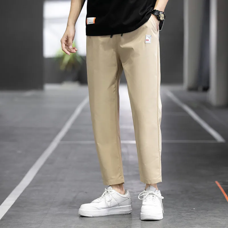 Pantaloni da uomo Sport coreani Studenti giovani estivi da uomo Ice Thin Straight Tube Pantaloni ad asciugatura rapida Boy Casual Pantaloni a 9 punti 230311