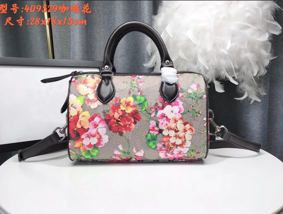 7a av högsta kvalitet tryckblommor 28 cm resväska lyx äkta läder unisex handväska tote crossbody axelpåsar snabba helgens tillflyktsduk påse 409529