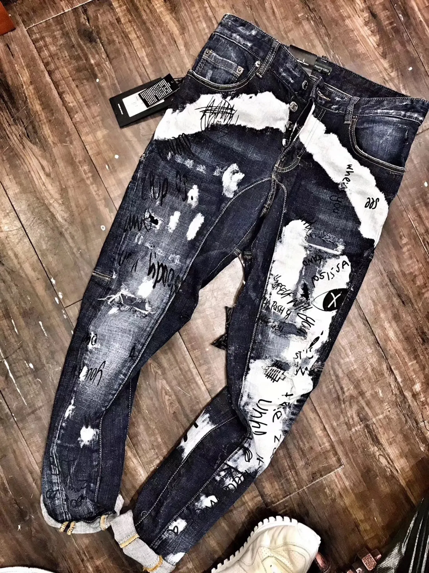 DSQ Phantom Turtle Men 's Jeans Mens 럭셔리 디자이너 청바지 스키니 찢어진 멋진 사람 인과 구멍 데님 패션 브랜드 피트 청바지를 씻는 바지 7817