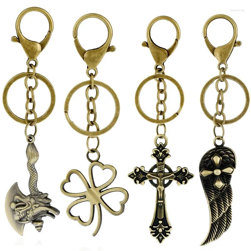 Nyckelringar vintage retro metall Keychain Bronze Pendant Rings Wing Cross Fish Holder For Car Keys Chain Fashion Bag Accessories Smyckespresent