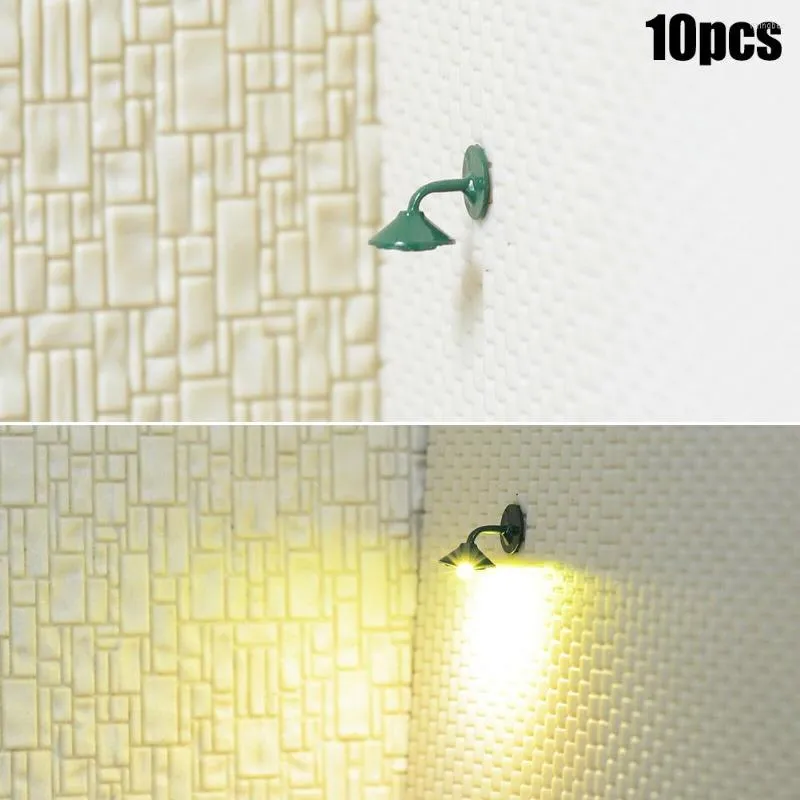 Fleurs décoratives 10 X OO / HO Mises en page à l'échelle Street Bracket Light Model Wall Lamp Posts LED Building Complete Painted Lights Lamps