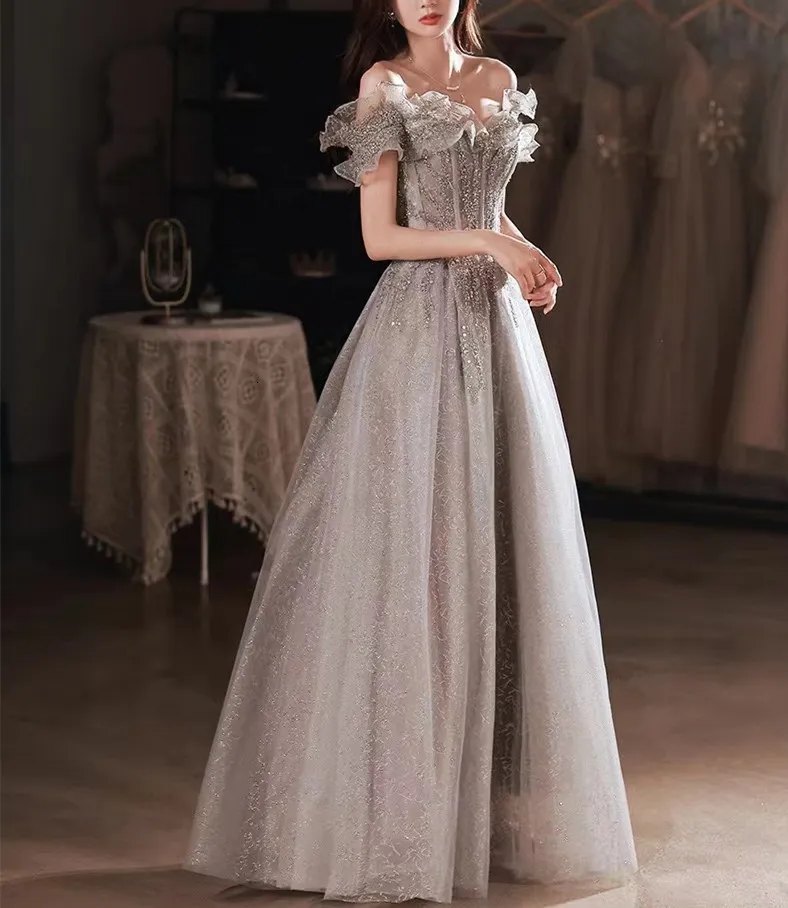 Elegant Gray Off-Shoulder Silver Evening Gowns with Shiny Sequin Lace and Ruched Detailing - Perfect for Formal Parties and Proms (Style #230314)