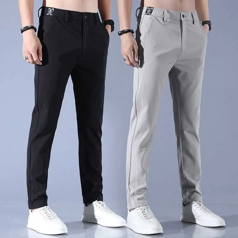 Męskie spodnie Wysokiej jakości męskie spodnie męskie spodnie Mężczyźni Spodnie Slim Fit Work Elastyczne talia Jogger Pant Outdoor Długie spodnie Dane Spant dla mężczyzn Z0306