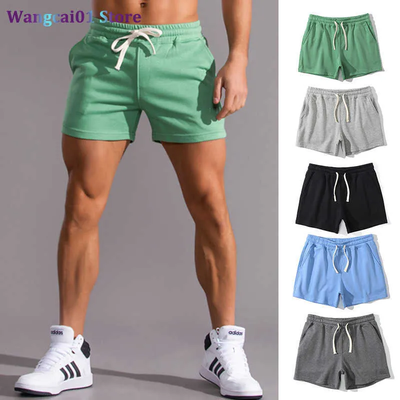 wangcai01 Shorts pour hommes Shorts d'été pour hommes Shorts en coton décontractés Homme Shorts de basket-ball surdimensionnés Sport Fitness Shorts Running Pantalons de survêtement Ma Vêtements 0315H23