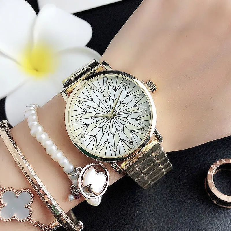 Top marque montres à Quartz femmes dame fille Style métal acier bande de luxe avec Logo montre-bracelet M91