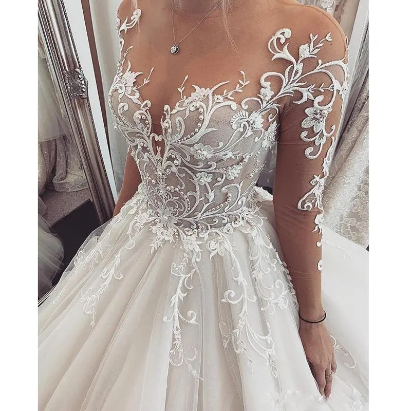 Floral Lace Applique A-Line Wedding Dresses Pearls Pärled Chapel Train Tulle Bridal Glowns Illusion Long Sleeves Transparent Sweetheart Halsling 2023 Vestido