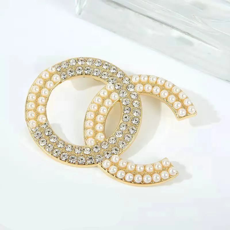 Elegant initial brooch From Featured Wholesalers