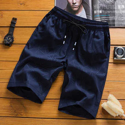 Heren shorts Nieuw 2022 Zomer Actief dunne ultralicht losse elastische taille snel drogende rits pocket casual strand shorts mannelijk ademende m-4xl g230315