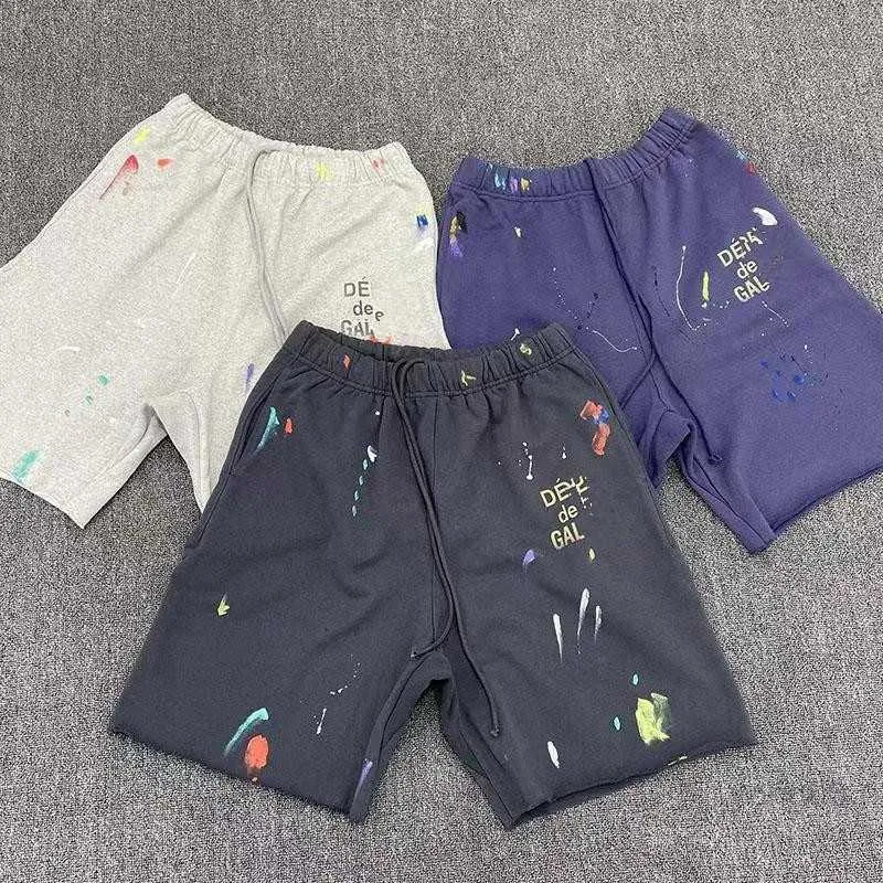 Couleur de shorts pour hommes Couleur Couleur d'encre Graffiti peint à la main et Capris sportif féminin