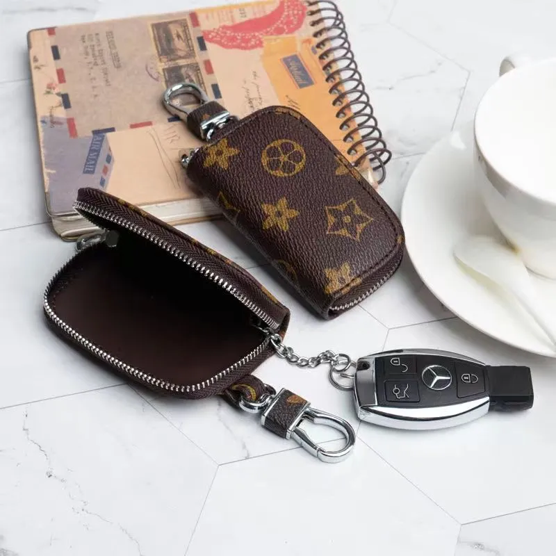 2023 Top Designer Men Universal Car Key Bags Case Unisex Manlig äkta Leather Key's Holder Women Dragkedja Smart Keychain Cases Cars Keys Pouch Bag Wallets