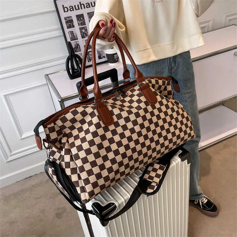 Duffel Bags New Short Distance Travel Bag Women s Large Capacity Korean Hand Multi Functional Fashionable Luggage 230316