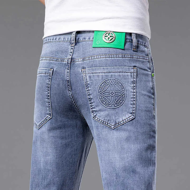 Printemps 2022 et été mince haut de gamme marque de mode Jeans hommes mince petit tube droit diffusion en direct