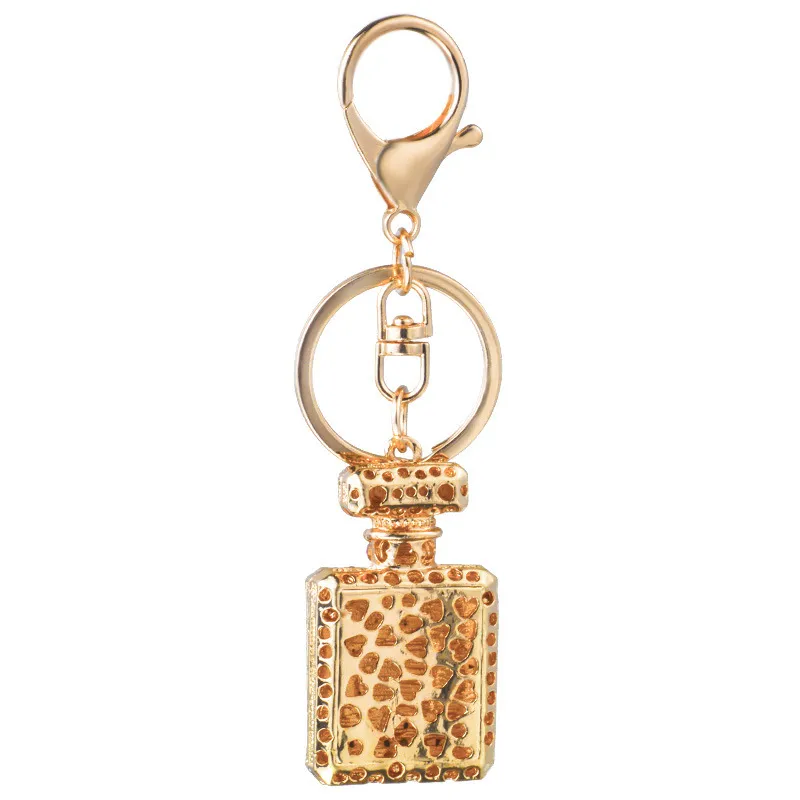 Design de mode porte-clés bouteille de parfum porte-clés pour femmes créatif cristal strass diamant métal voiture porte-clés chaîne sac pendentif cadeau bon