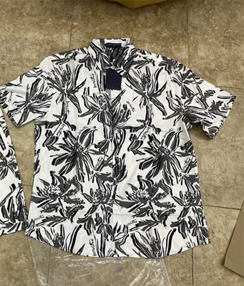 23S Nieuwe Hawaiiaanse printshirt Designer Heren Short -Sleeved Shirt Spring Summer Casual Shirt Street Hip -Hop Heren Casual Beach Shorts Printpatroon 3xl