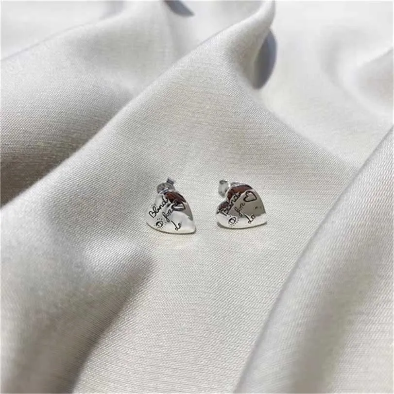 2023 Designer New Fashion Jewelry Gujia S925 Silver Love Fearless Round Love Cat Face Face Five Pointed Star Ear Small Fresh Nails Begagna örhängen