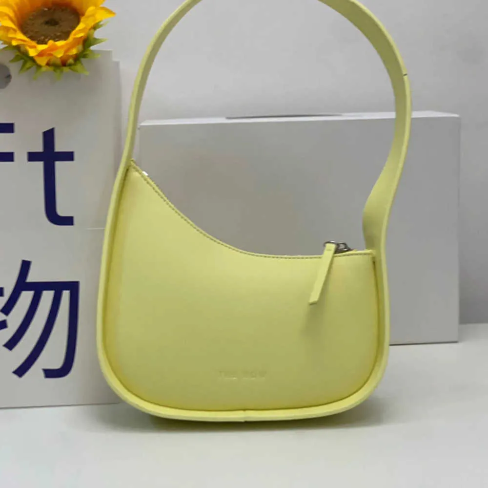 2023 The Row Borsa a mezzaluna in pelle liscia Designer da donna con tracolla piatta e chiusura con cerniera curva Pochette Tote Fodera sudata Ascella