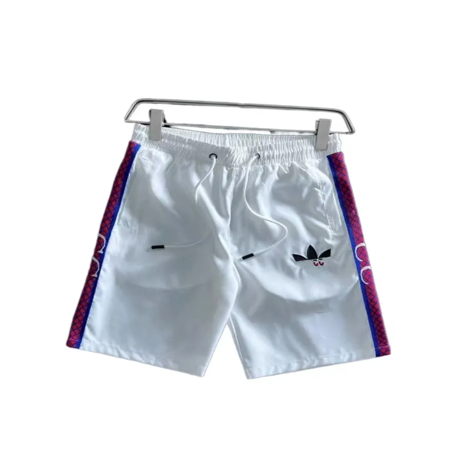 Shorts esportivos shorts de designer de calça de calça curta Mulheres mans cargas cargas treinos treino corte streetwear roupas verão quente europa vendendo shorts de grife