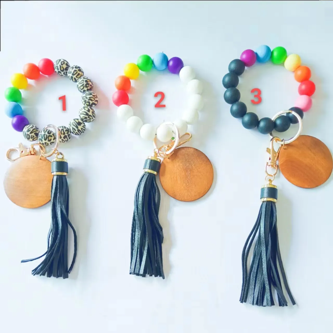 Foreign trade beaded bracelet key chain personalized creativity silicone rainbow bracelet PU leather tassel key ring