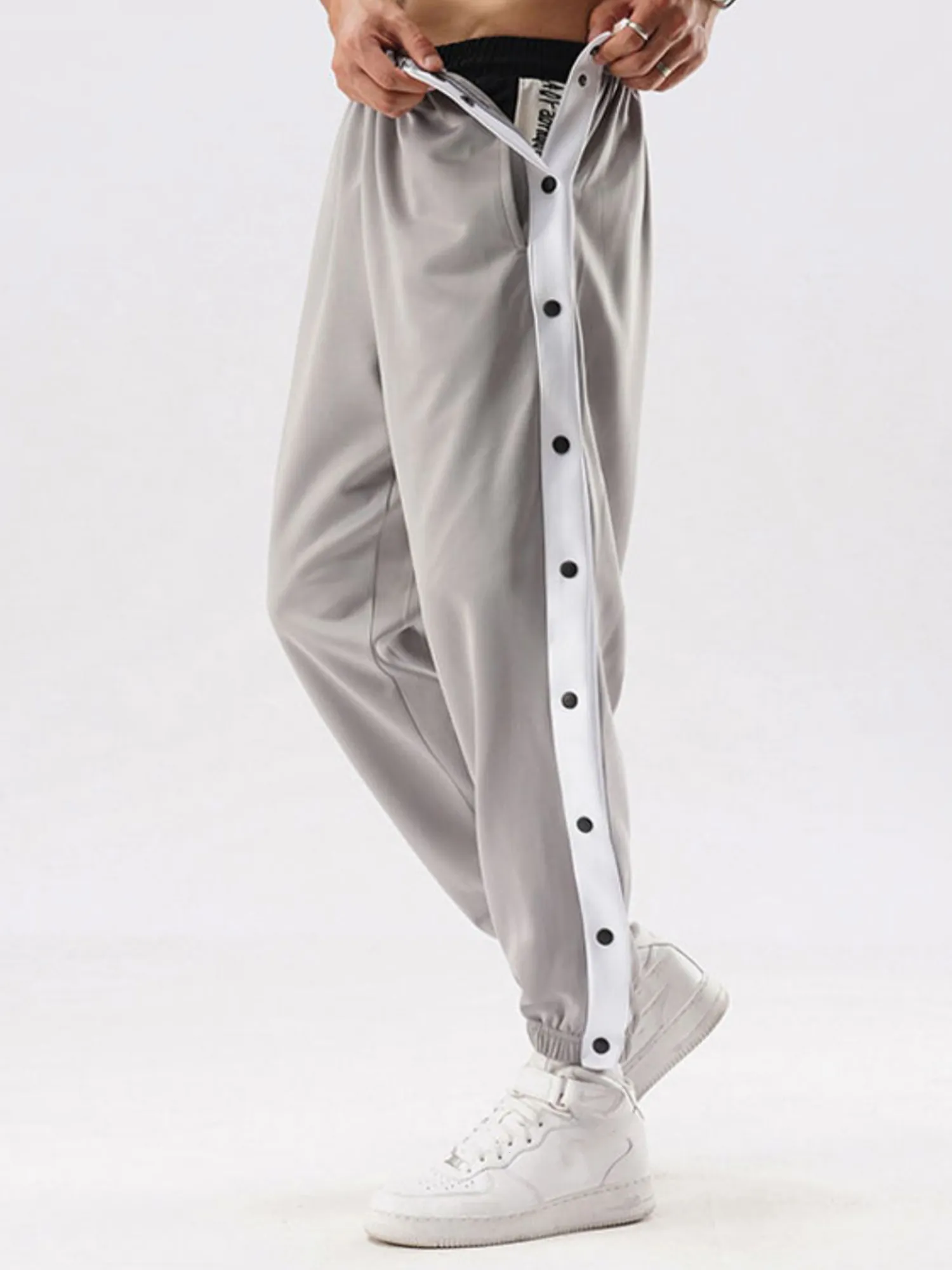 Pantalones de chándal con botón lateral para hombre, ropa