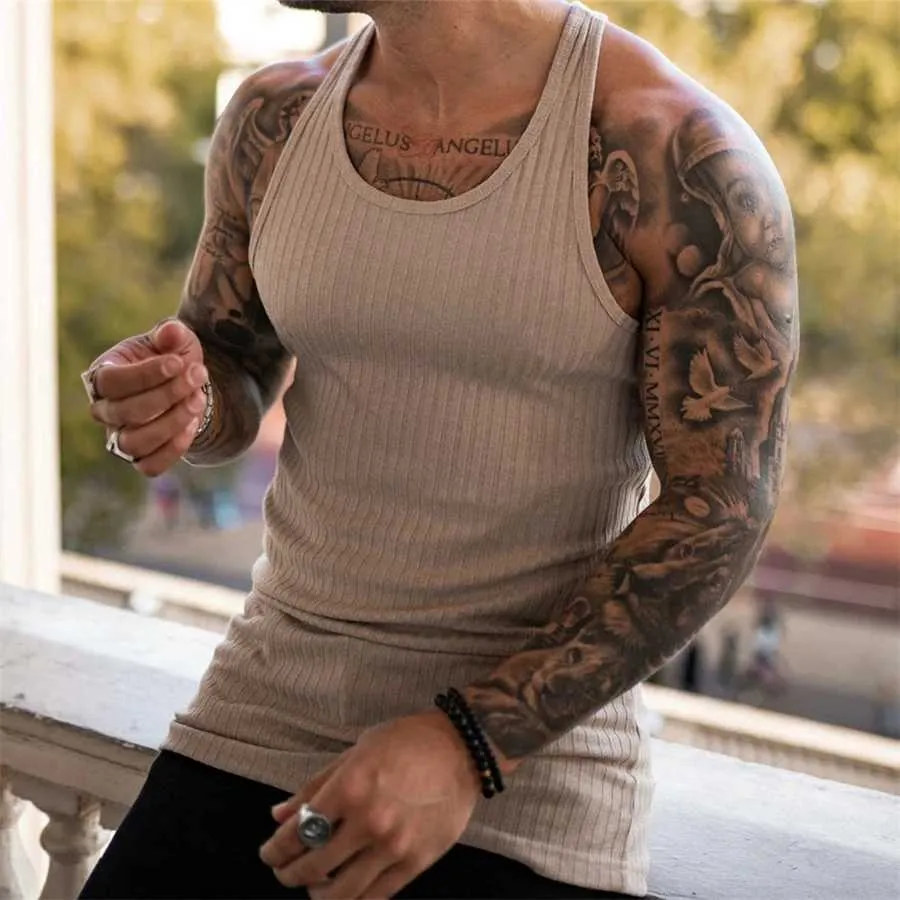 41 Amazing Fitness Tattoos for Men [2024 Inspiration Guide]