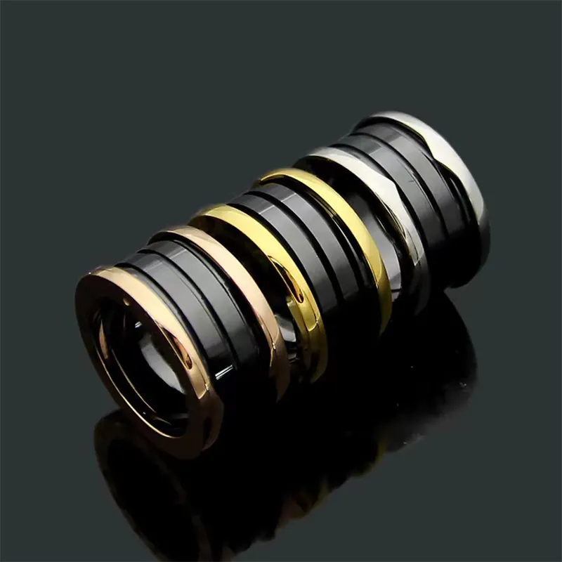 DHgate.com:Classic designer ring for women Fashion black and white ...