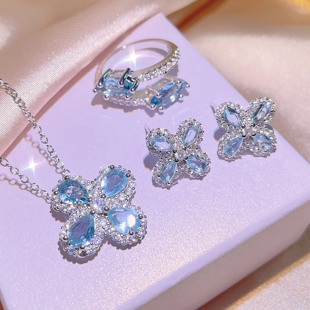 2023 Nuovi orecchini a contropiede a trifoglio geometrio Orecchini da donna Bling Blue Diamond Crystal Crystal Piece Orecchi di lussuoso Orecchi Collane
