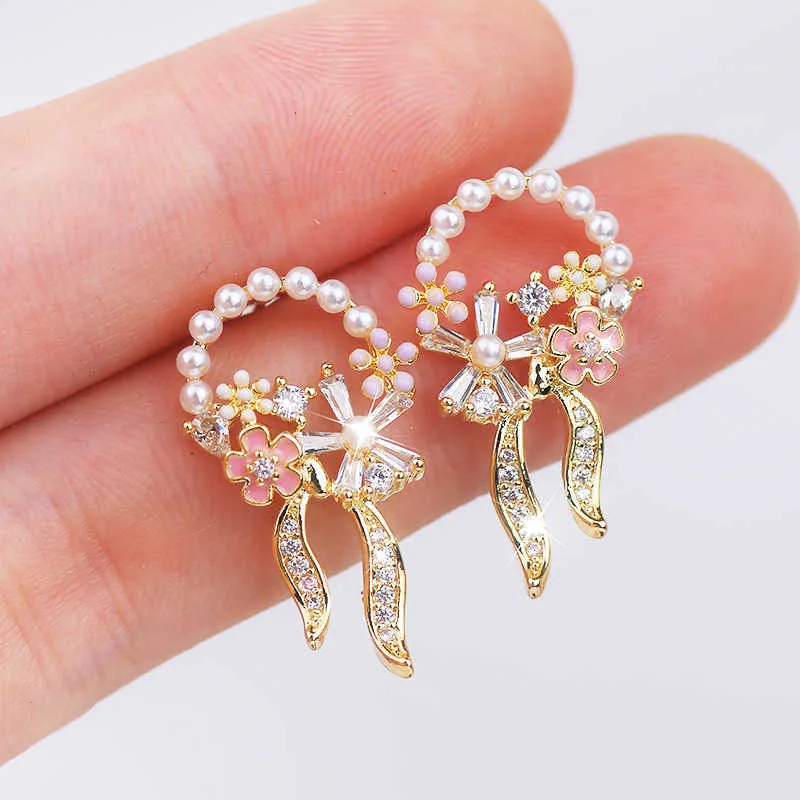 Fascino francese romantico colore rosa fiore squisito bowknot zircone orecchini per le donne semplice luce lusso signora perla orecchino regalo G230320