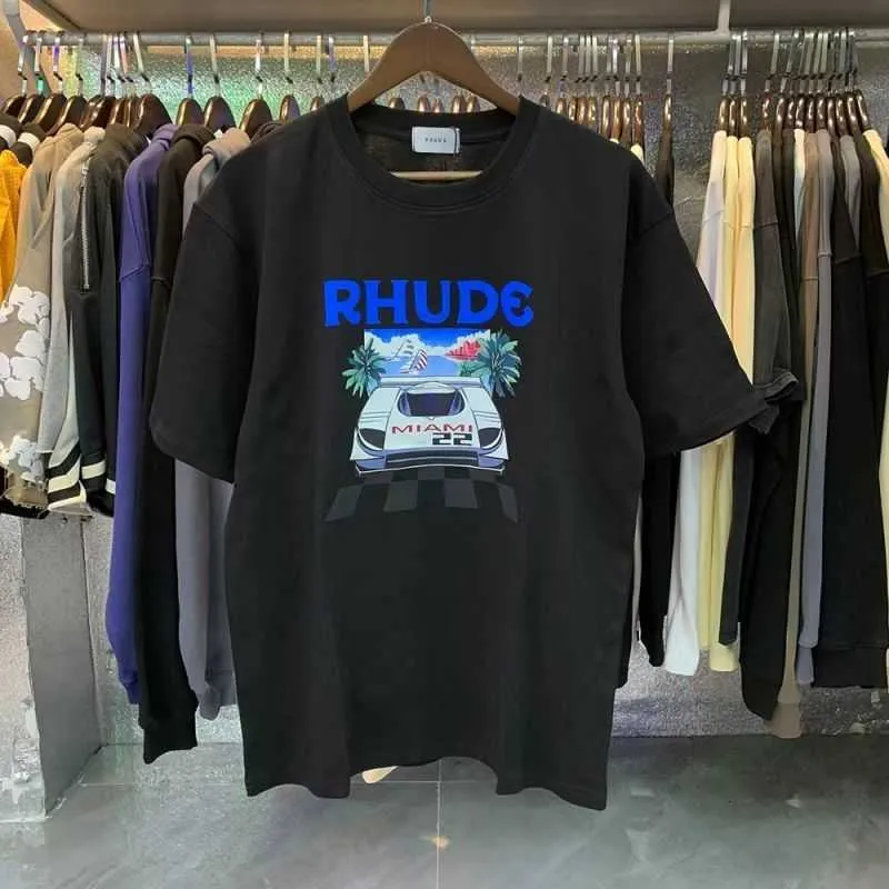 23SS Fashion Brand Rhude American Street Ins High Street Stampa sciolta da uomo e femmina Pure's Cotton Round Neck Short Shiting T-shirt Summer Us Size S-XXL Y17