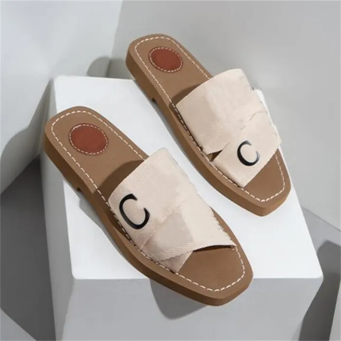 Nieuwe stijl dames sandalen ontwerper vrouwen muilezels platglaasjes kanten letters fabric canvas slippers dames zomer buitenschoenen