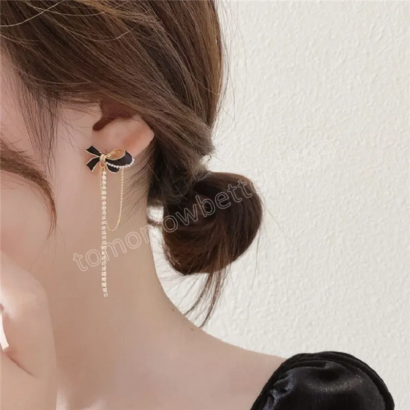 Boucles d'oreilles pendantes coréennes bijoux de mode métallisé noir nœud papillon forme pendentif Long gland cristal boucles d'oreilles pour les femmes Brincos Pendientes