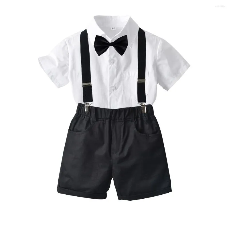 Set di abbigliamento Summer Boy Camicia a maniche corte bianca pura con papillon a maniche corte Pantaloncini con bretelle neri Tuta casual per bambini KF1105