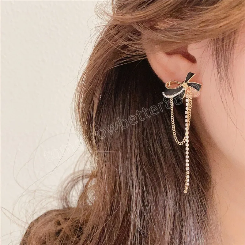 Boucles d'oreilles pendantes coréennes bijoux de mode métallisé noir nœud papillon forme pendentif Long gland cristal boucles d'oreilles pour les femmes Brincos Pendientes