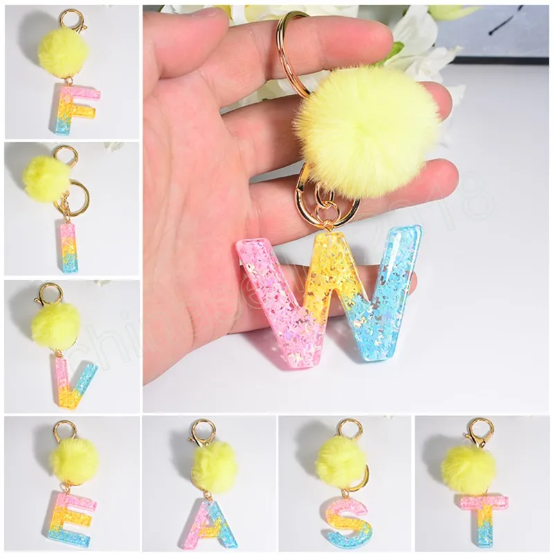 Arc-en-ciel 26 lettres porte-clés jaune pompon boule de poil porte-clés femmes sac pendentifs clé accessoires cadeaux