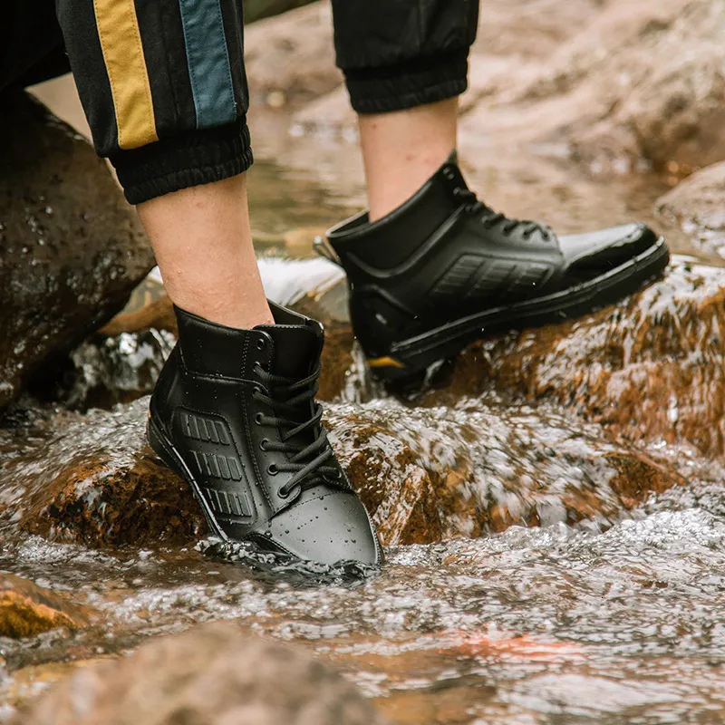 Regenlaarzen waterdichte schoenen mannen zwarte high top enkellaarzen voor regen casual platte regenboots voor mannen mode rubber regenlaarzen maat
