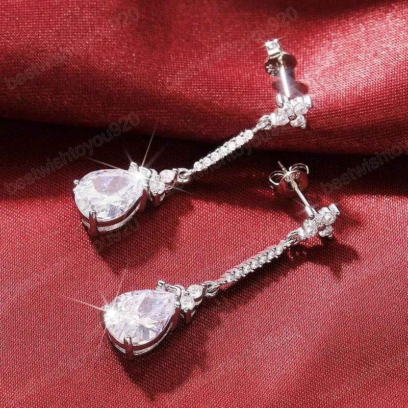 Boucles d'oreilles pendantes en cristal et zircone cubique pour femmes, accessoires de luxe, couleur argent, bijoux tendance de mariage de tempérament