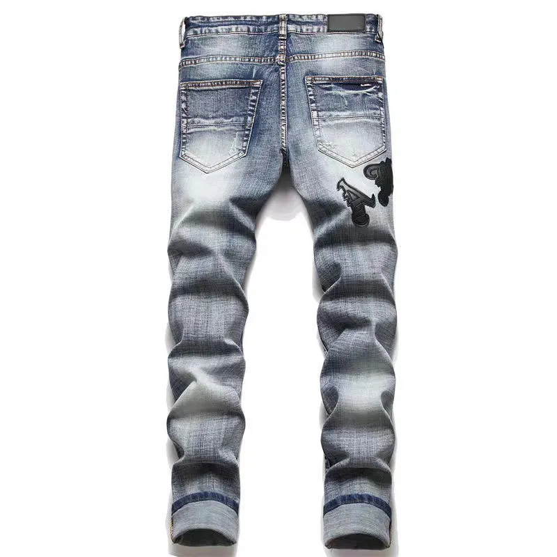 2023 Europäische und amerikanische Herren Jeans Designer zerrissene Jeans Hip-Hop High Street Modemarke Radfahren Motorradstickerei eng anliegende schlanke Bleistifthose