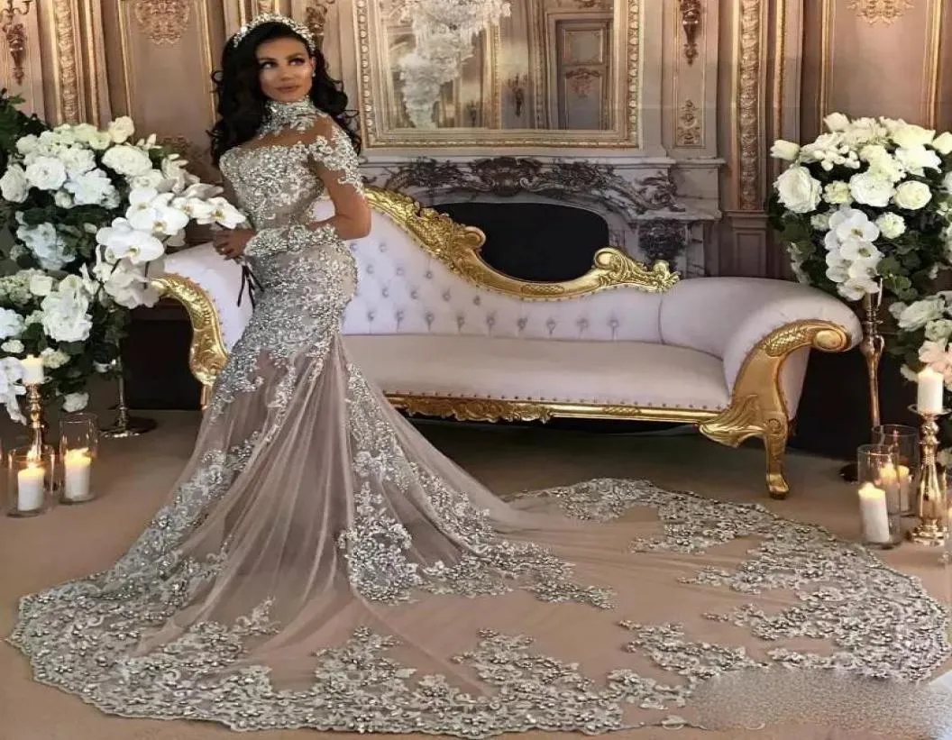 Dubai Arabic Luxury Sparkly 2021 Wedding Dresses Sexy Bling Beaded Lace Applique High Neck Illusion Long Sleeves Mermaid Chapel Br3240886