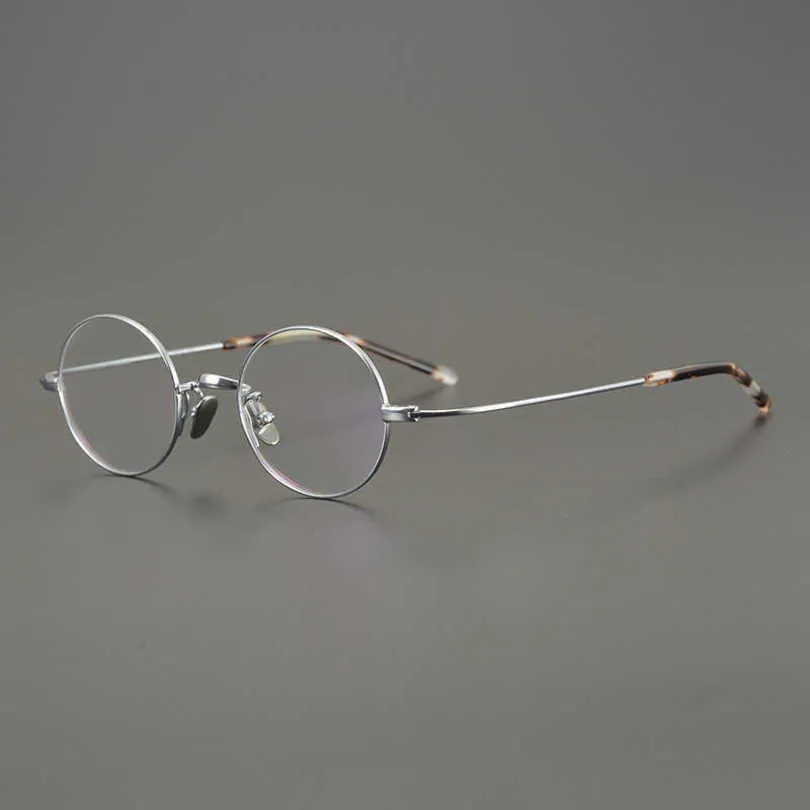 10% rabatt på lyxdesigner Nya herr- och kvinnors solglasögon 20% rabatt på japansk liten rund handgjorda ultralätt myopia Pure titanium fullspolglas med höjd