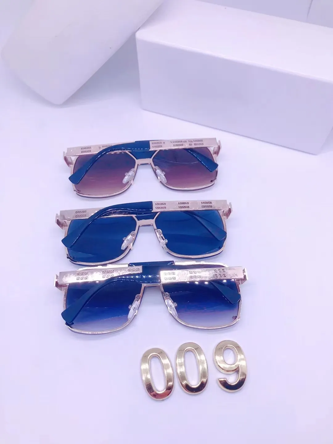 2023 Hot Nieuwe luxe designer merk vierkante zonnebrillen Designer Zonnebril Hoogwaardige bril Dames Men Blazen Dames Zonneglas UV400 Lens Unisex met doos 009