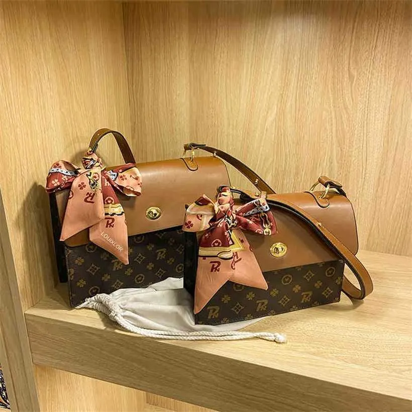 여자 고급 디자이너 New Summer Handbag Liu Shishi의 같은 여성 어깨 스타일 휴대용 대각선 교차 대용량 서류 가방