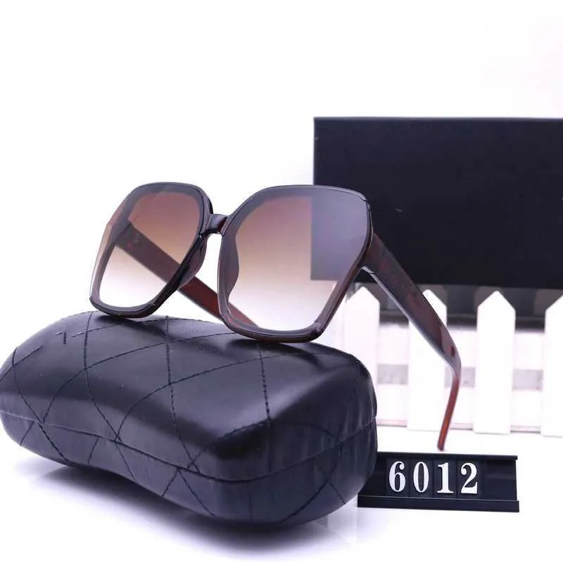 Designer de luxe nouvelles lunettes de soleil pour hommes et femmes 20% de réduction sur les lunettes de mode de voyage de tir de rue à l'étranger 6012