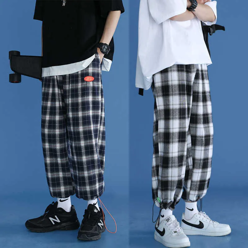 Herenbroek 2023 Nieuwe Koreaanse mode-unisex All-match trendy flanel brede broek losse streetwear joggers Harajuku plaid broek acht pant W0325