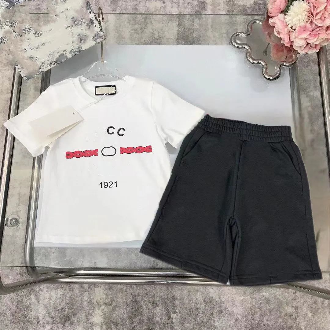 En stock 2-12 ans Designer enfants vêtements ensembles T-shirt pantalon ensemble marque impression enfants 2 pièces pur coton vêtements bébé garçons fille mode Appare