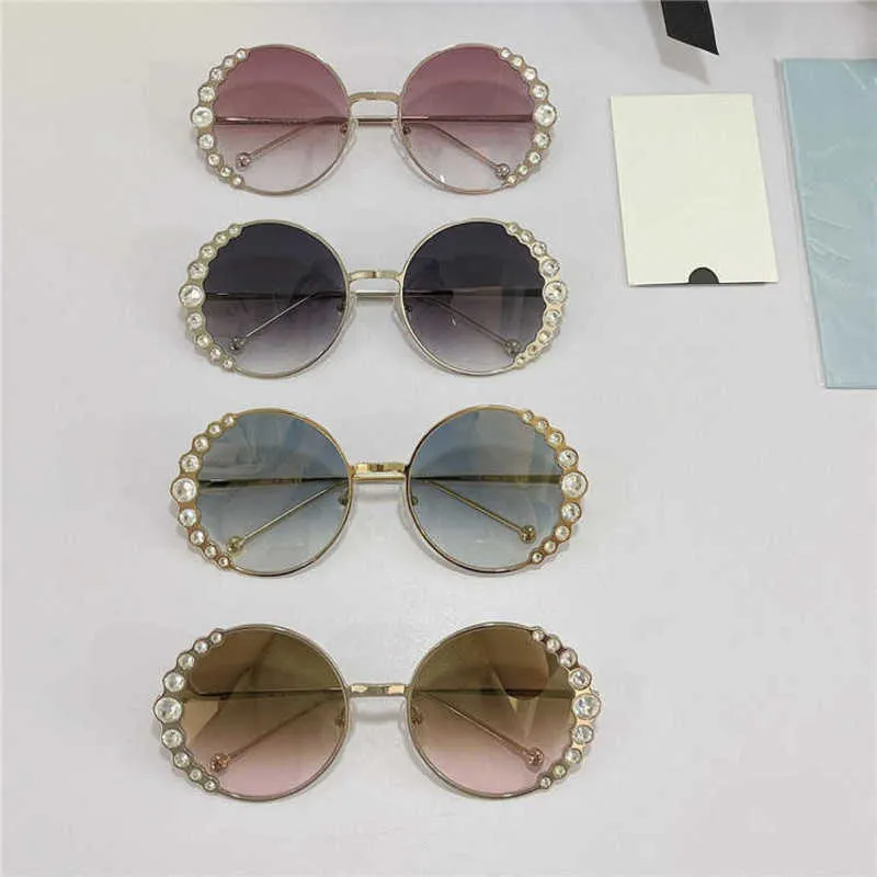 Lyxdesigner Nya män och kvinnors solglasögon 20% rabatt på Familjens modediamantrimmade runda ram Wu Jinyans samma FF0324