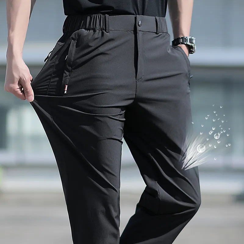 Men's Pants Large Size Summer Big Ice Silk Stretch Breathable Straight Leg 6XL Quick Dry Elastic Band Black Trousers 230325