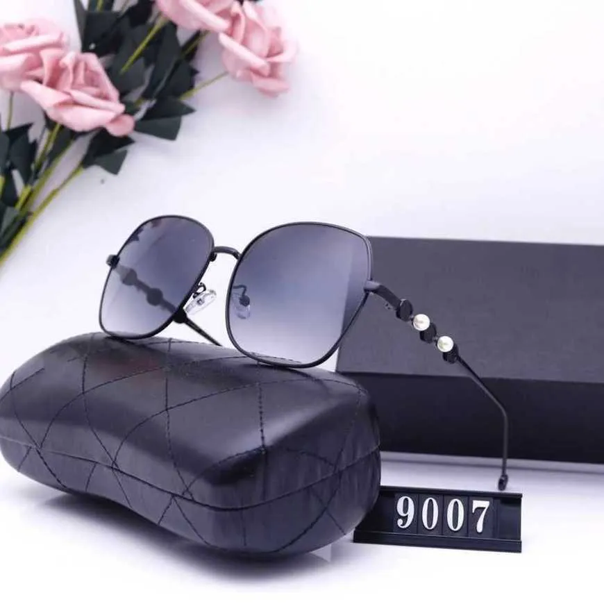 Designer de luxo de alta qualidade óculos de sol 20% de desconto no exterior Tiro de viagens de gama de moda 9007