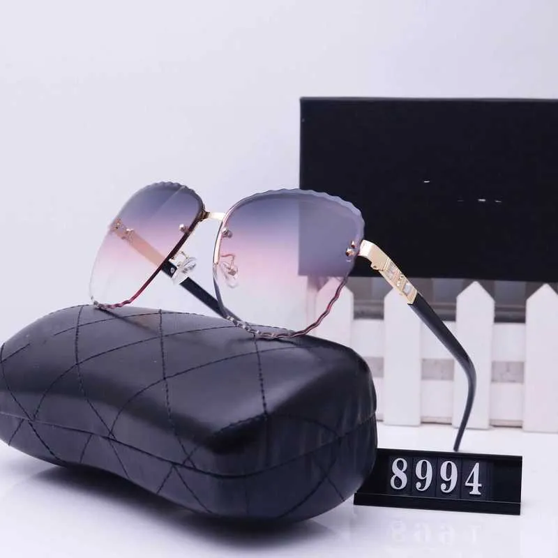 Lyxdesigner Nya herr- och kvinnors solglasögon 20% rabatt på utländska gatuskytte modeglasögon 8994