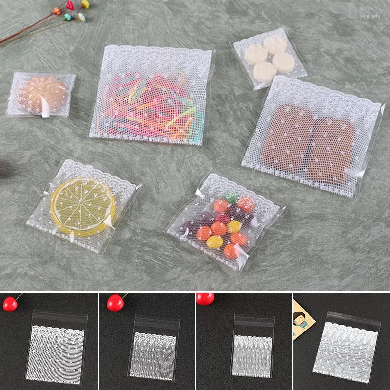 ギフトラップ100pcsホワイトレースプラスチック自己接着クッキーパッケージバッグキャンディースナックベーキングバッグウェディングパーティー用品